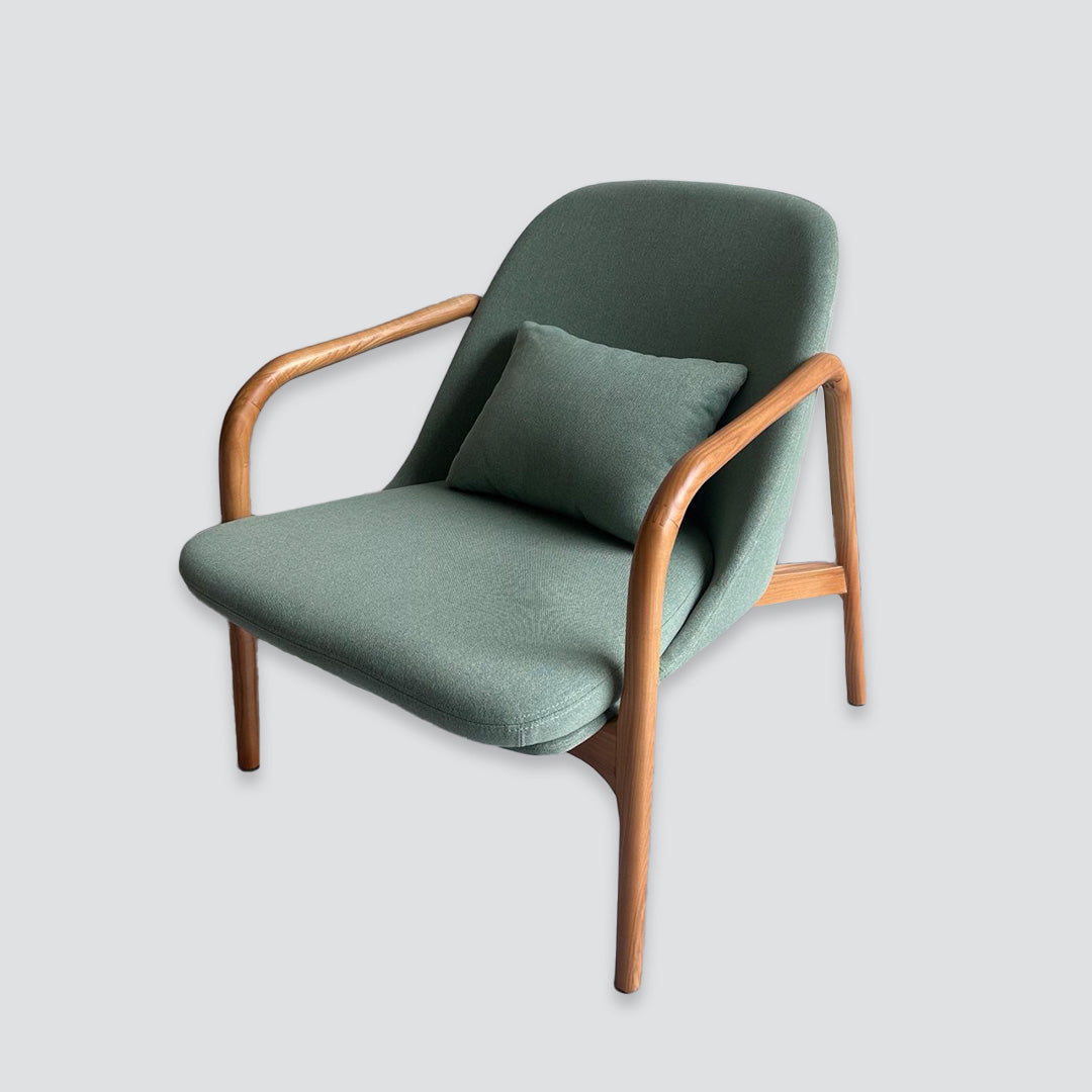 Wooden armchair in light green fabric