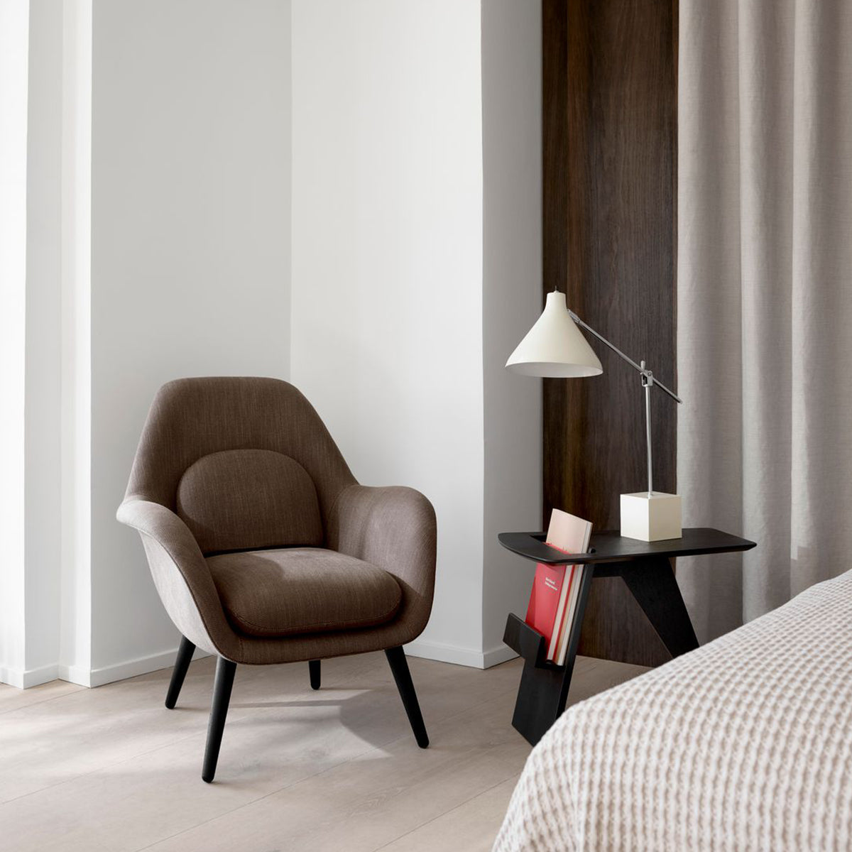 Black side table with magazine rack